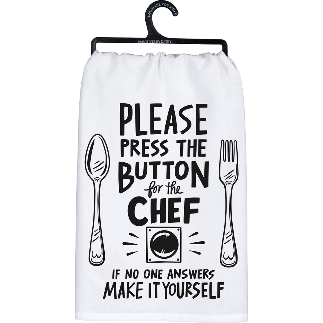 White cotton kitchen towel with black text and graphics: "PLEASE PRESS THE BUTTON for the CHEF IF NO ONE ANSWERS MAKE IT YOURSELF".