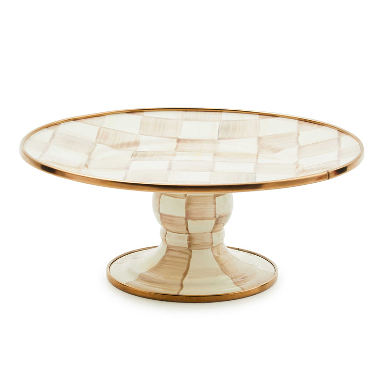 Mocha Check Mini Pedestal Platter with hand-painted checks and bronzed stainless steel rim.