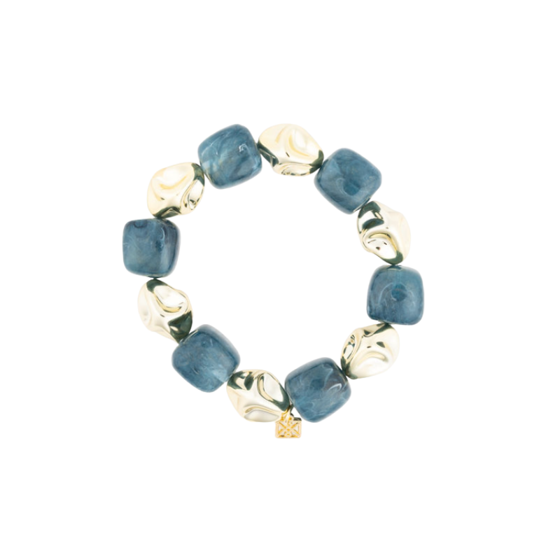 Lyla Bracelet featuring alternating chunky blue marbled and polished gold organic-shaped beads.