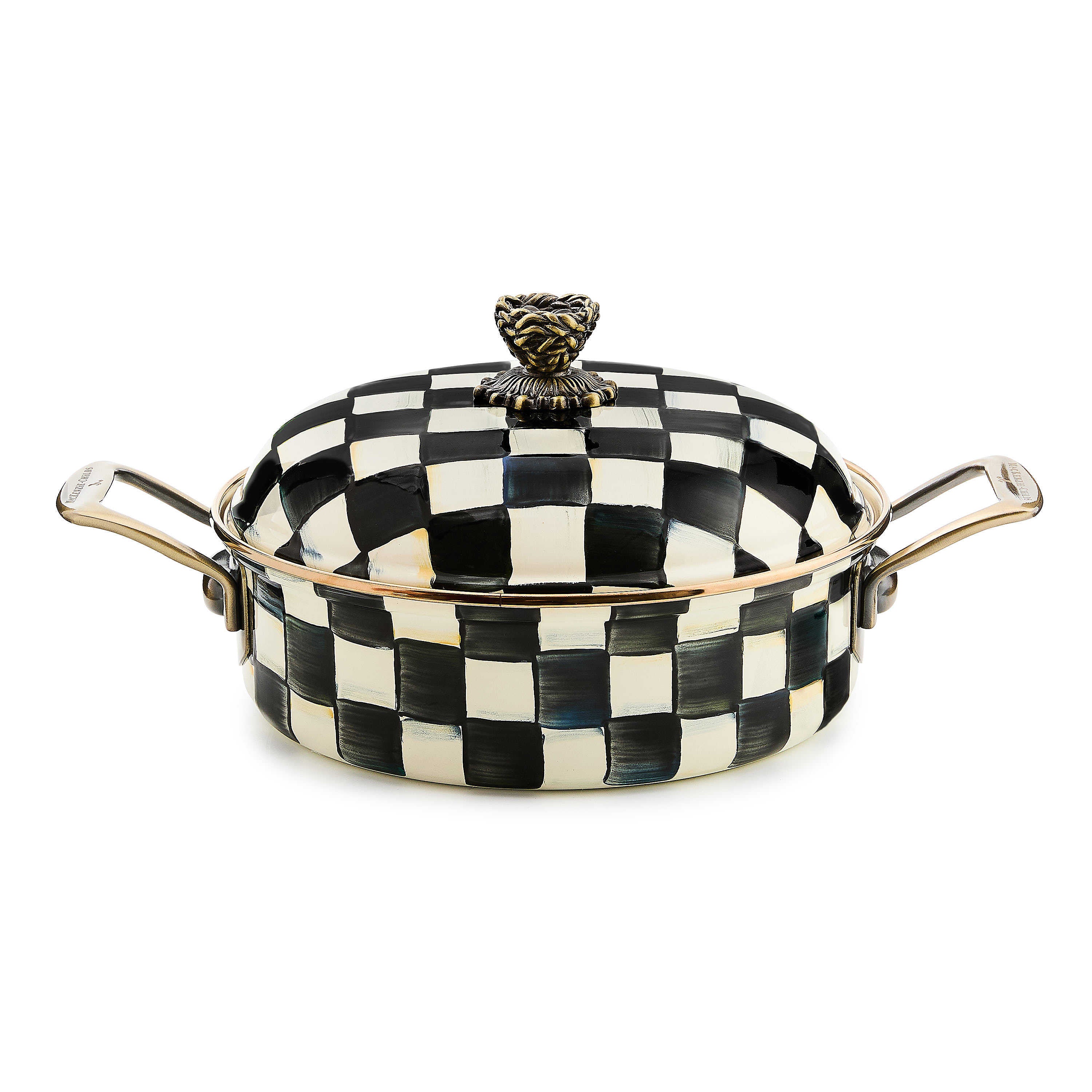 Courtly Check enamel 3 quart casserole with black and white hand-painted pattern and brass handles.