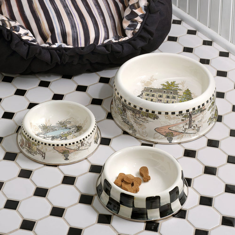 Small Courtly Check pet dish with hand-painted blue floral pattern on steel base and bronzed stainless rim.