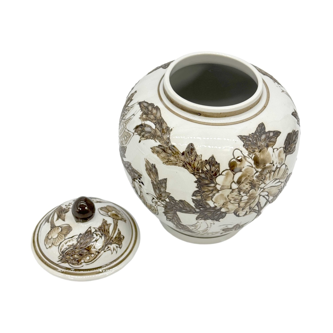 10-inch brown and white chinoiserie ceramic urn style jar with floral pattern and matching lid.