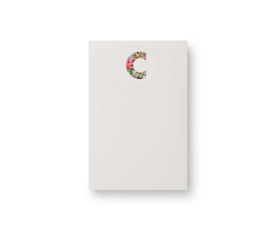 Garden Party monogram notepad with tear-off sheets in a floral pattern.