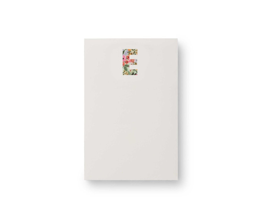 Garden Party monogram notepad with illustrated floral border in soft pastel colors.