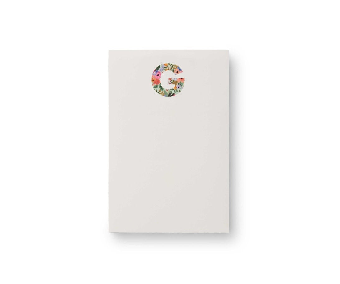 Garden Party monogram notepad with tear-off sheets in a floral botanical pattern.