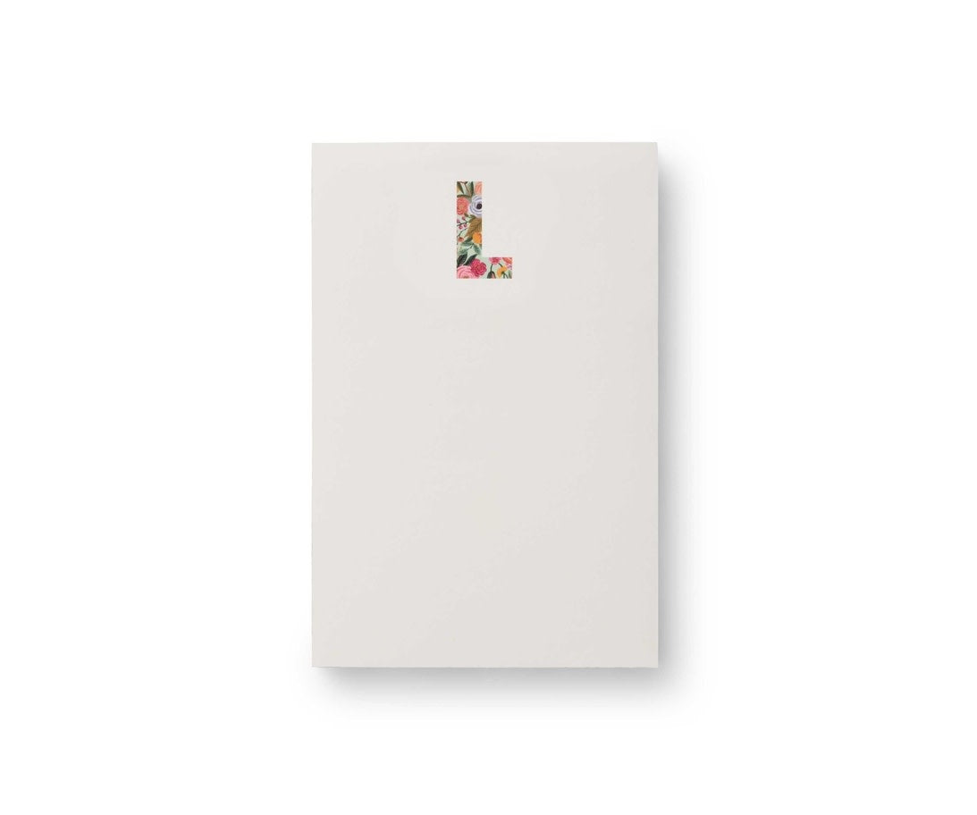 Garden Party monogram notepad with floral botanical illustrations on white paper.