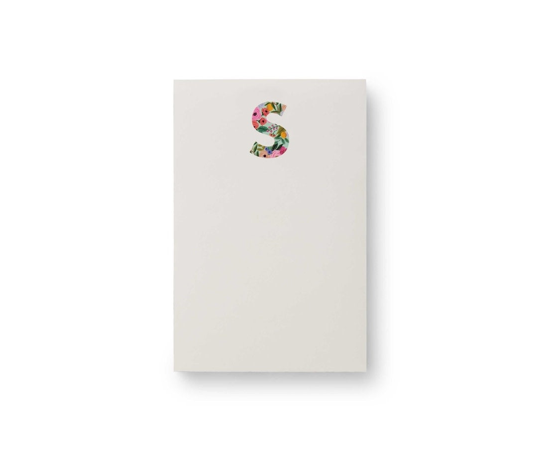 Garden Party monogram notepad with tear-off sheets in a floral pattern.