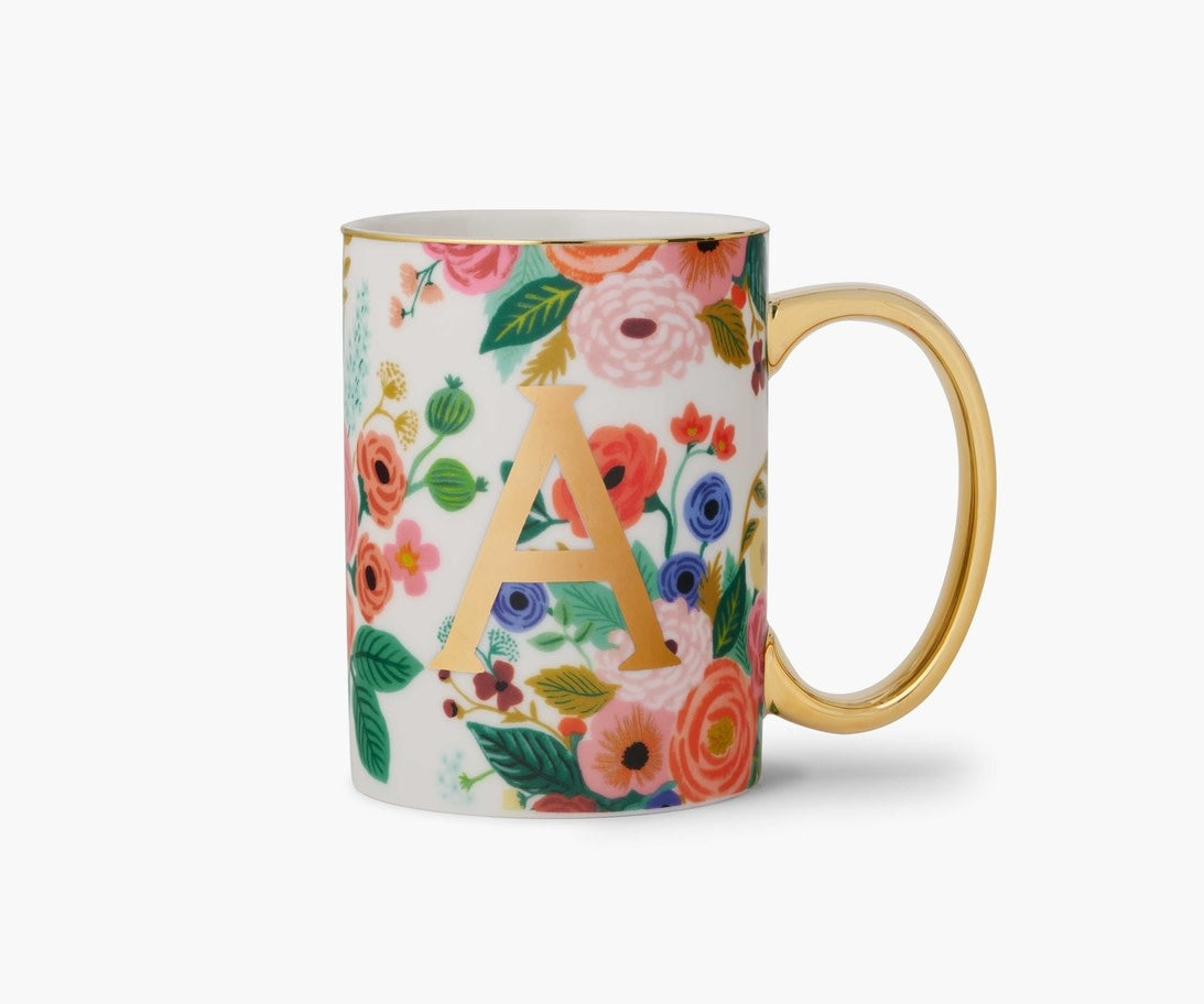 Porcelain mug with Garden Party floral illustration, gold foil monogram, gilded rim and handle.
