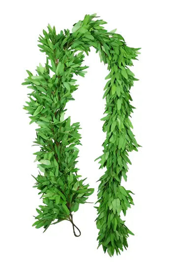 Seeded eucalyptus garland with green foliage arranged in a long curved silhouette.