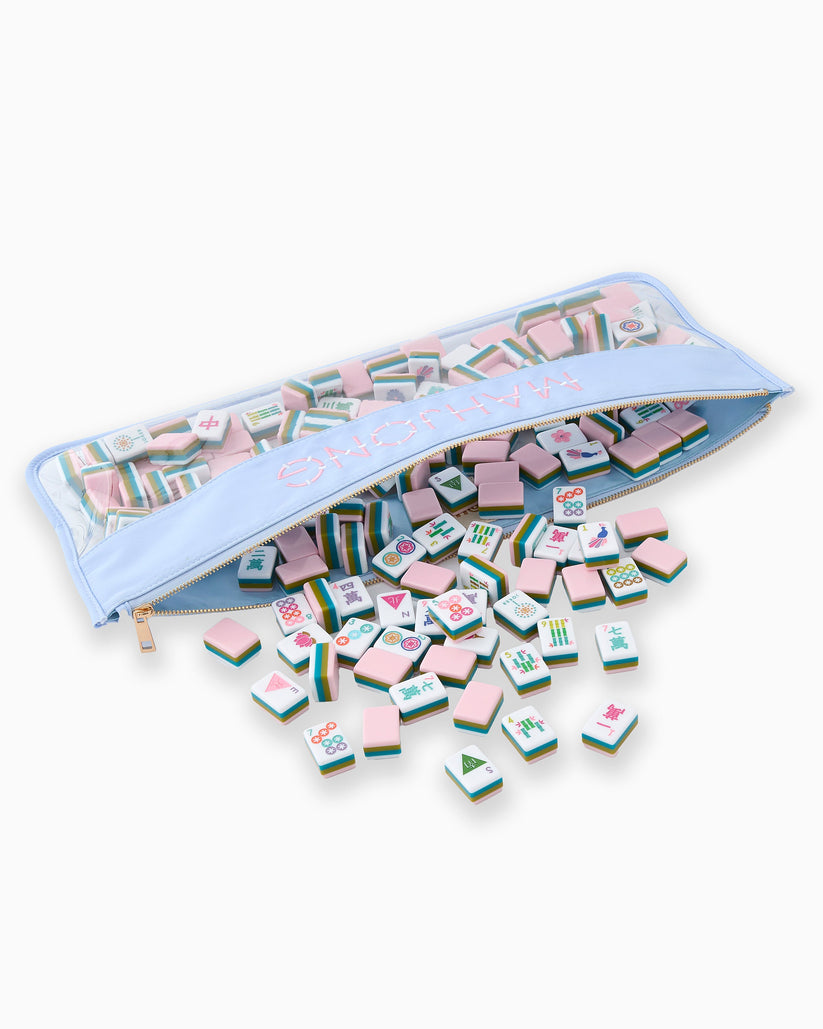 Light blue zippered mahjong bag with pink embroidery, filled with colorful mahjong tiles.