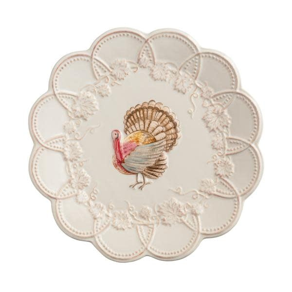 Turquoise stoneware salad plate with scalloped edge