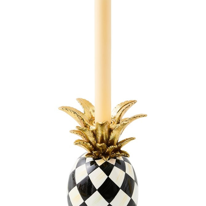 Hand-painted resin pineapple candle holder with gold leaf accents.