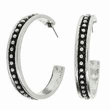 Western-style bubble hoop earrings in a metallic finish with a rounded circular silhouette.