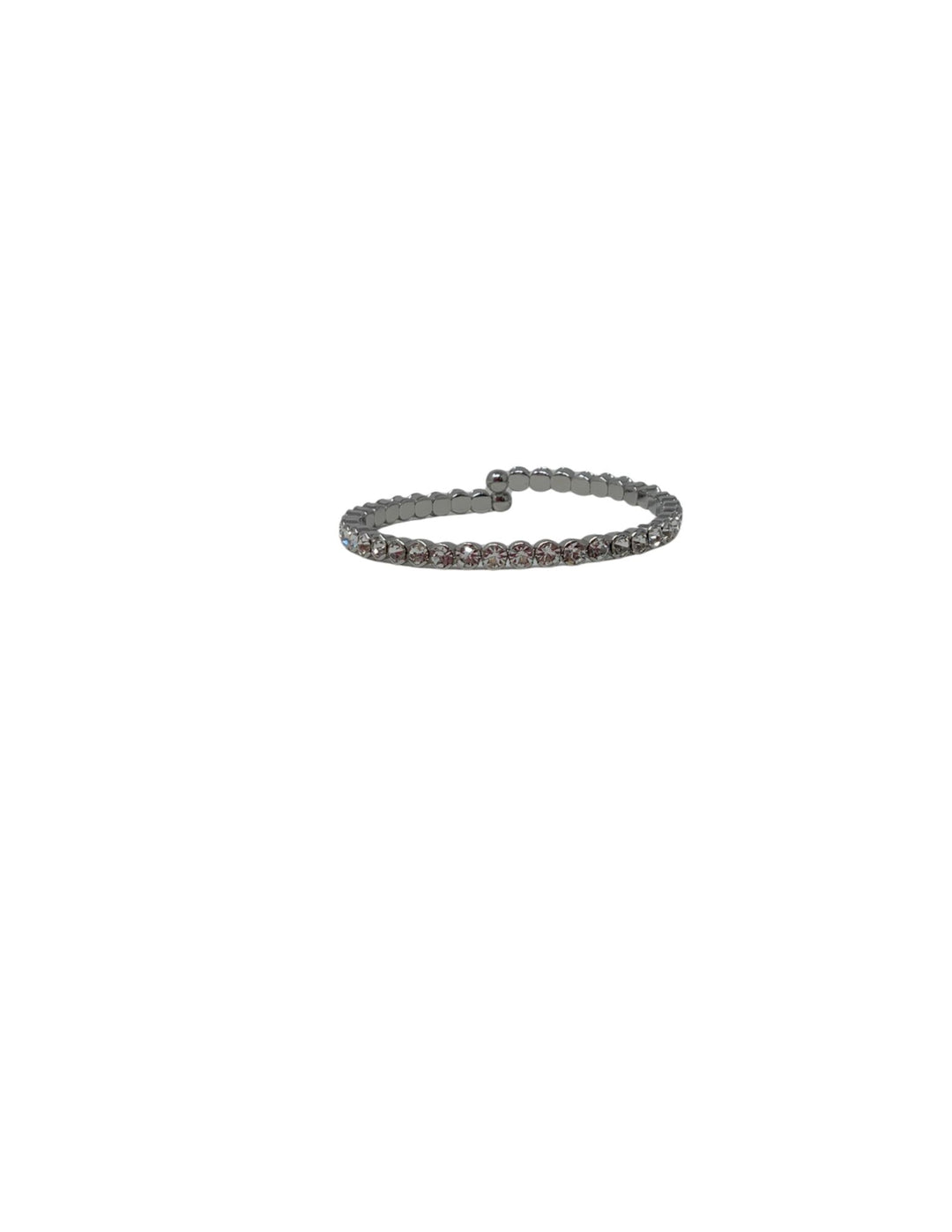 Silver-tone crystal cuff ring featuring a single row of round clear crystals on a flexible band.