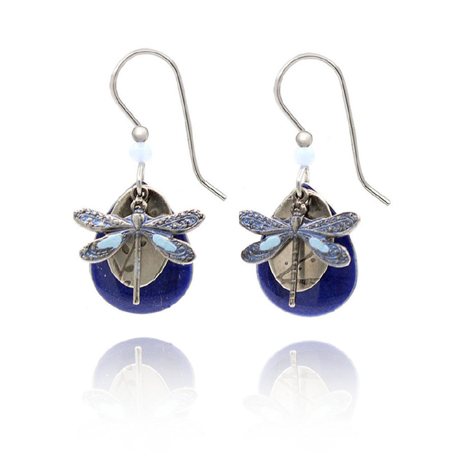 Stainless steel dangle earrings featuring a dragonfly on layered geometric shapes with French wire backs.