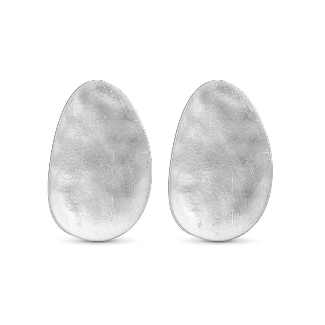 Luna Matte Large Oval Silver Earrings with a textured, brushed finish.