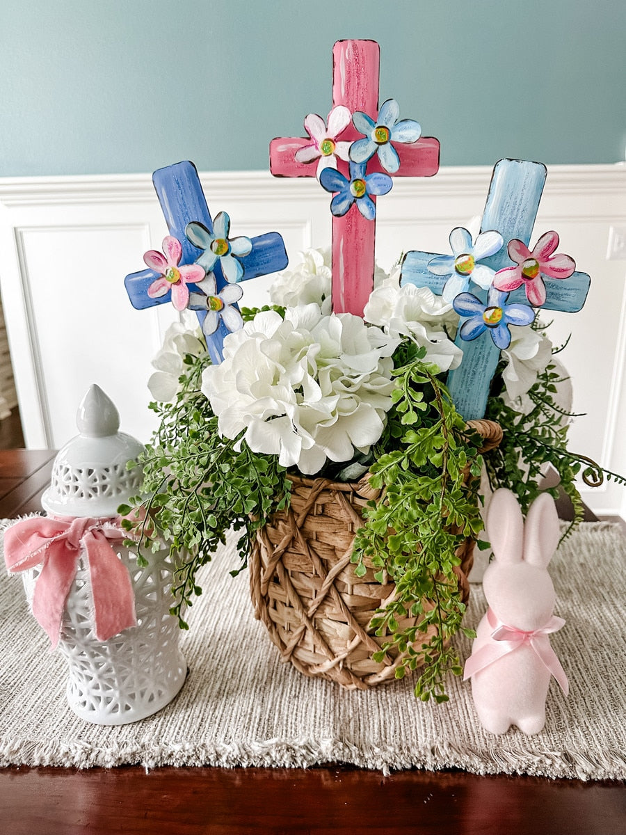 Floral Crosses stake featuring a white cross with red floral patterns on a natural wood finish.