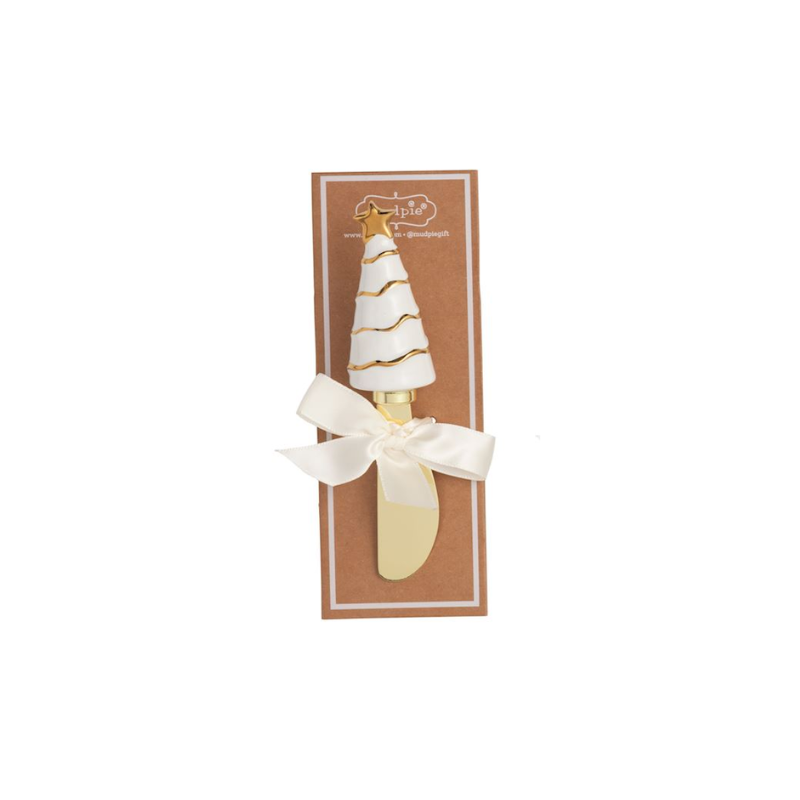 Christmas spreader with a white stoneware tree handle, gold details, and a cream satin ribbon.