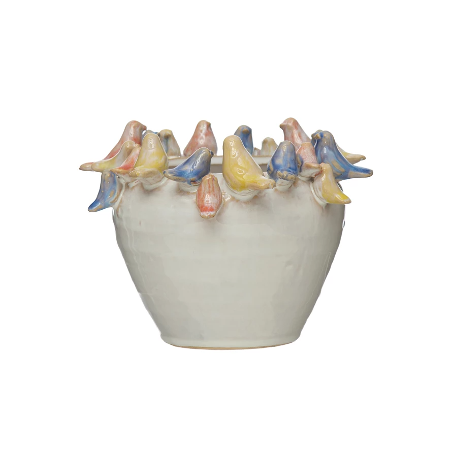 Round stoneware planter with reactive glaze featuring bird silhouettes on the rim.