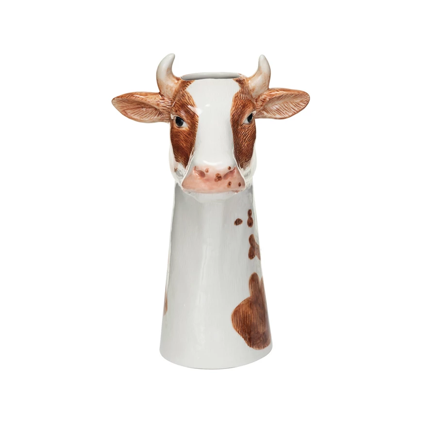 Round stoneware cow vase with hand-painted natural earth tones.