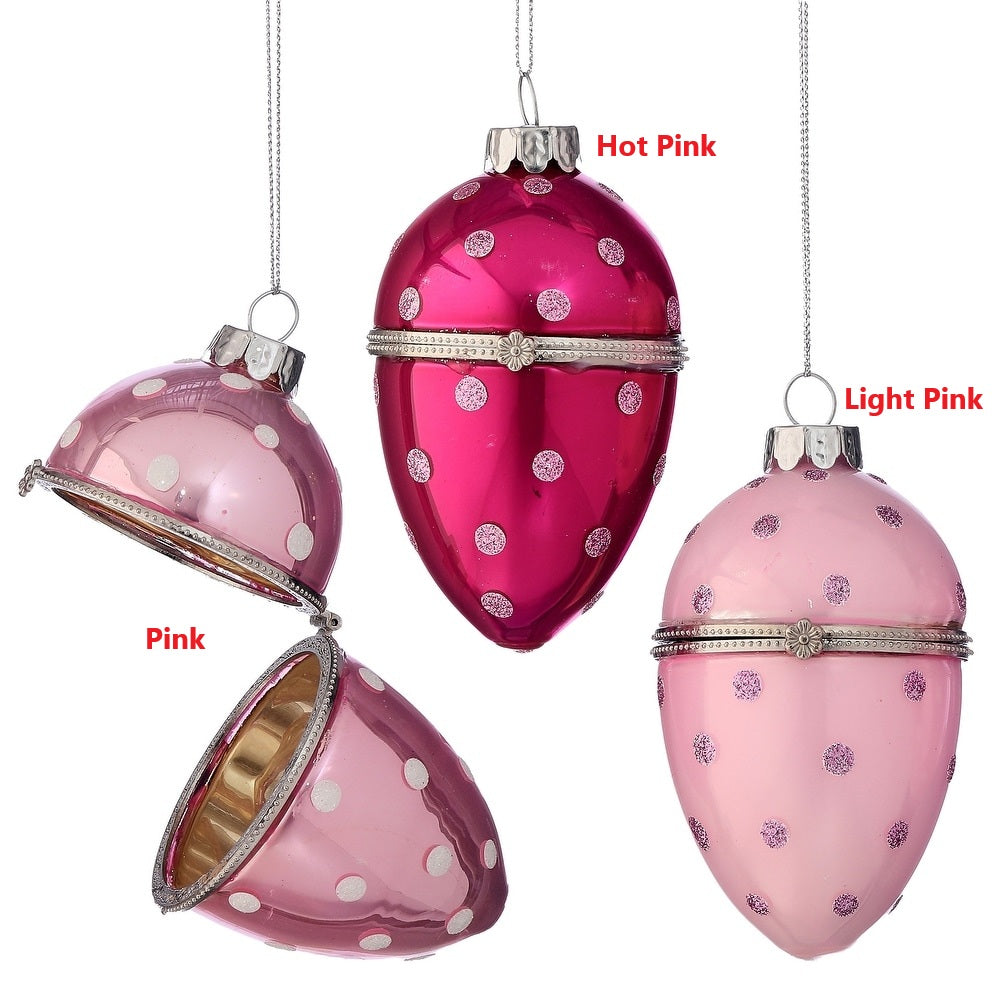 Hand-finished glass egg ornament with a glossy finish featuring vibrant polka dots on an oval silhouette.