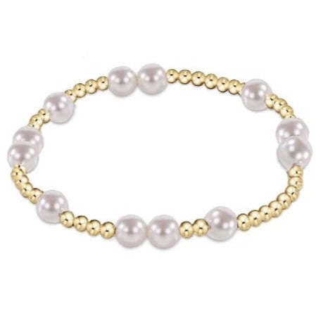 Hope Unwritten 6mm bead bracelet featuring 14kt gold-filled beads and white crystal pearls.