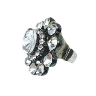 Silver tone stretch ring with clear rhinestone floral cluster