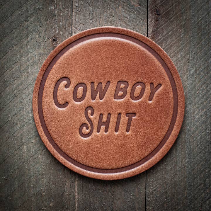 Square leather coaster with a natural patina finish