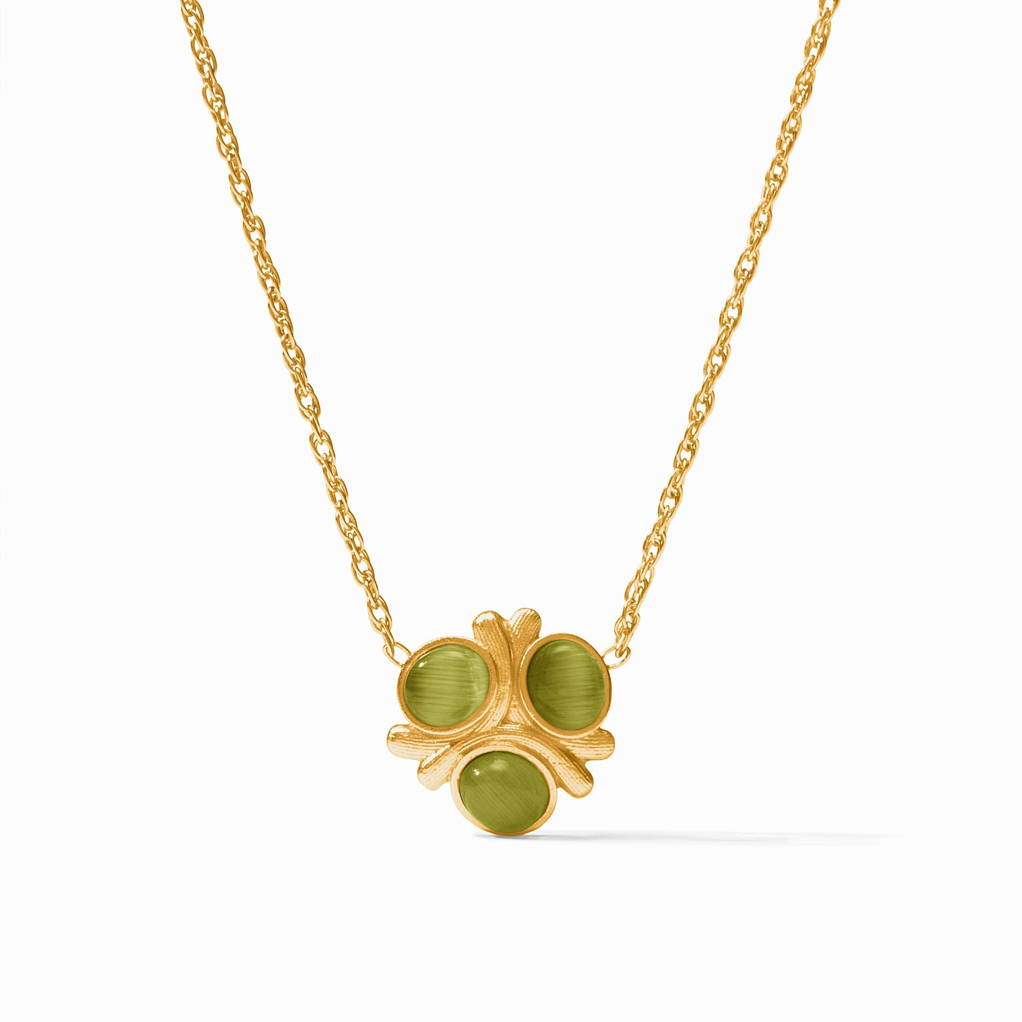 Gold chain necklace with a clover-shaped pendant featuring three round green glass stones.