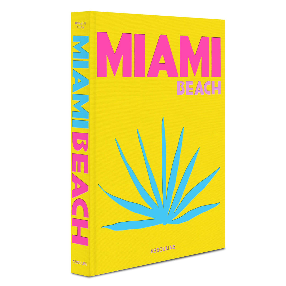 Linen hardcover book titled Miami Beach with a tropical illustration cover.