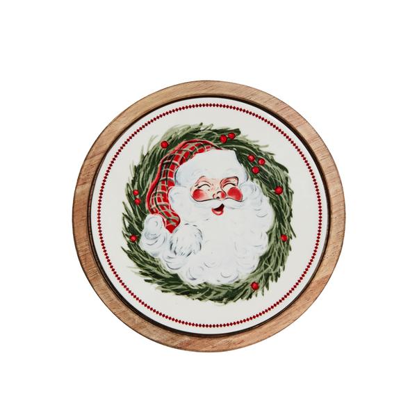 Round wooden Santa trivet with a stoneware center featuring a vintage Santa Claus and wreath.