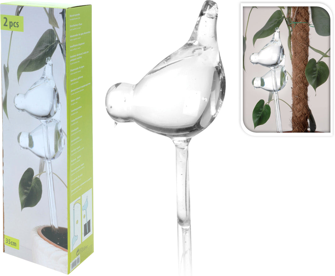 Set of two bird-shaped clear glass plant waterers with long stems, shown in and out of packaging.