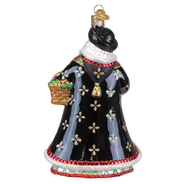 Back view of a Slovak Father Christmas glass ornament in a black robe with gold floral patterns.
