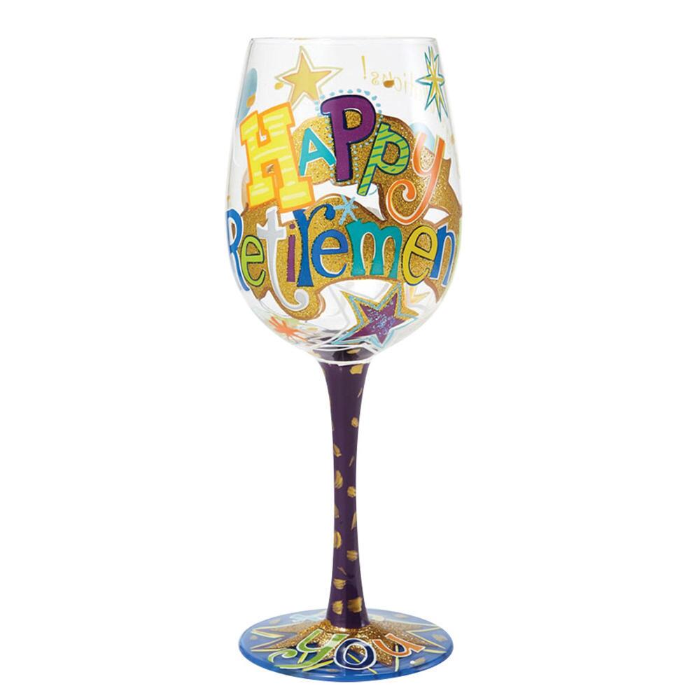 Colorful blown glass wine glass with hand-painted designs, glitter accents, and a cocktail recipe printed on the base.