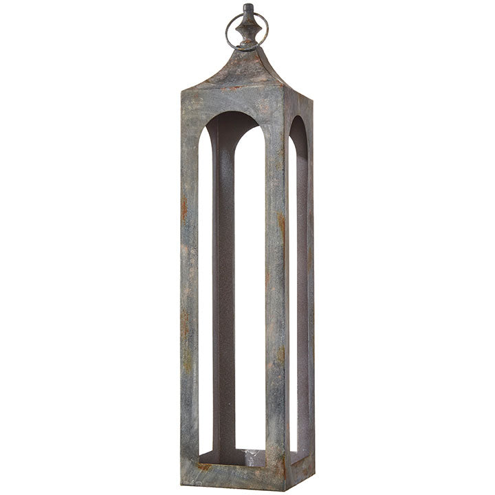 Iron lantern with a cylindrical silhouette featuring vertical slats.