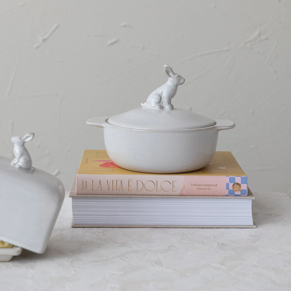 White stoneware 4-cup baker with rabbit finial handle