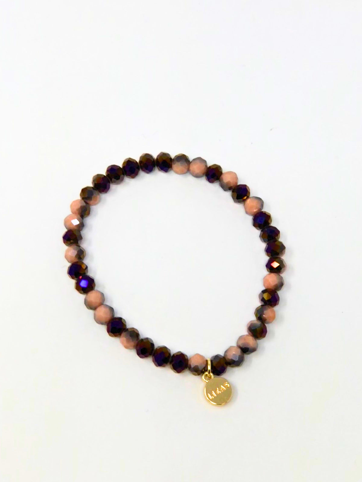 Stretchy beaded bracelet with faceted glass beads in a colorful pattern.