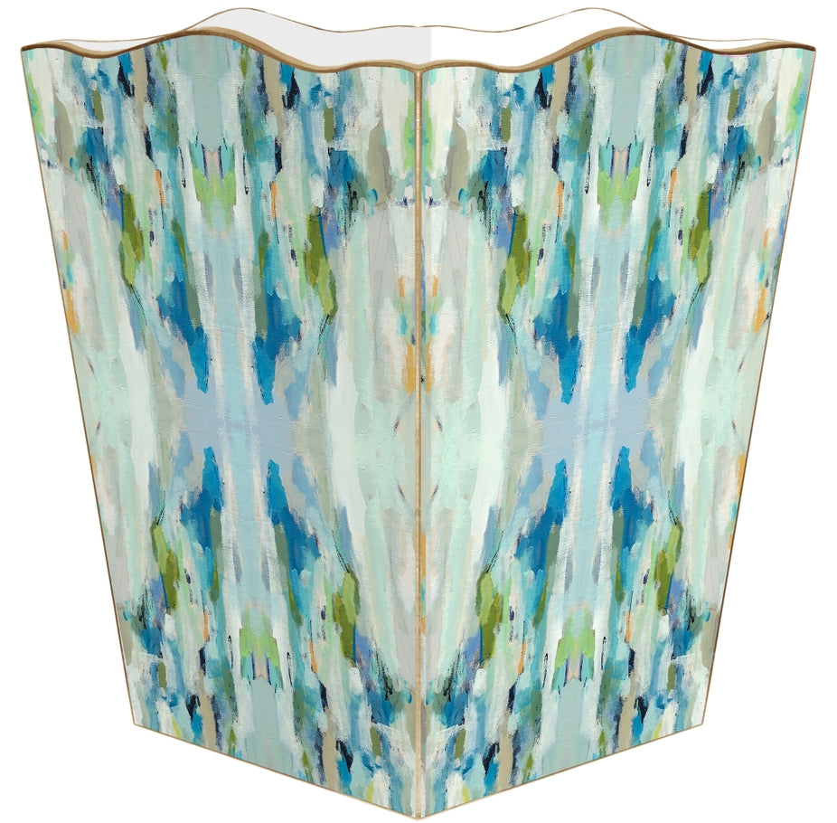 Scalloped wastepaper basket with an abstract blue, green, and white painterly pattern.