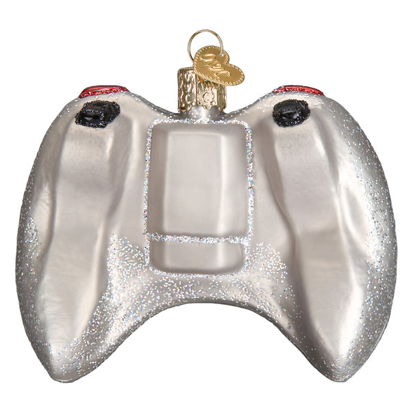 Silver glass video game controller ornament with glitter accents and a gold hanging loop.