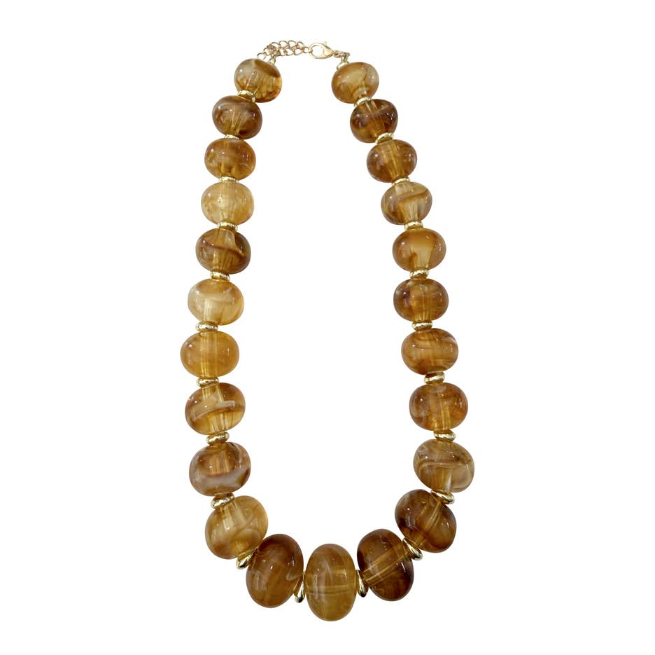 Chunky tortoise marble beaded necklace with gold-plated spacers and an adjustable clasp.