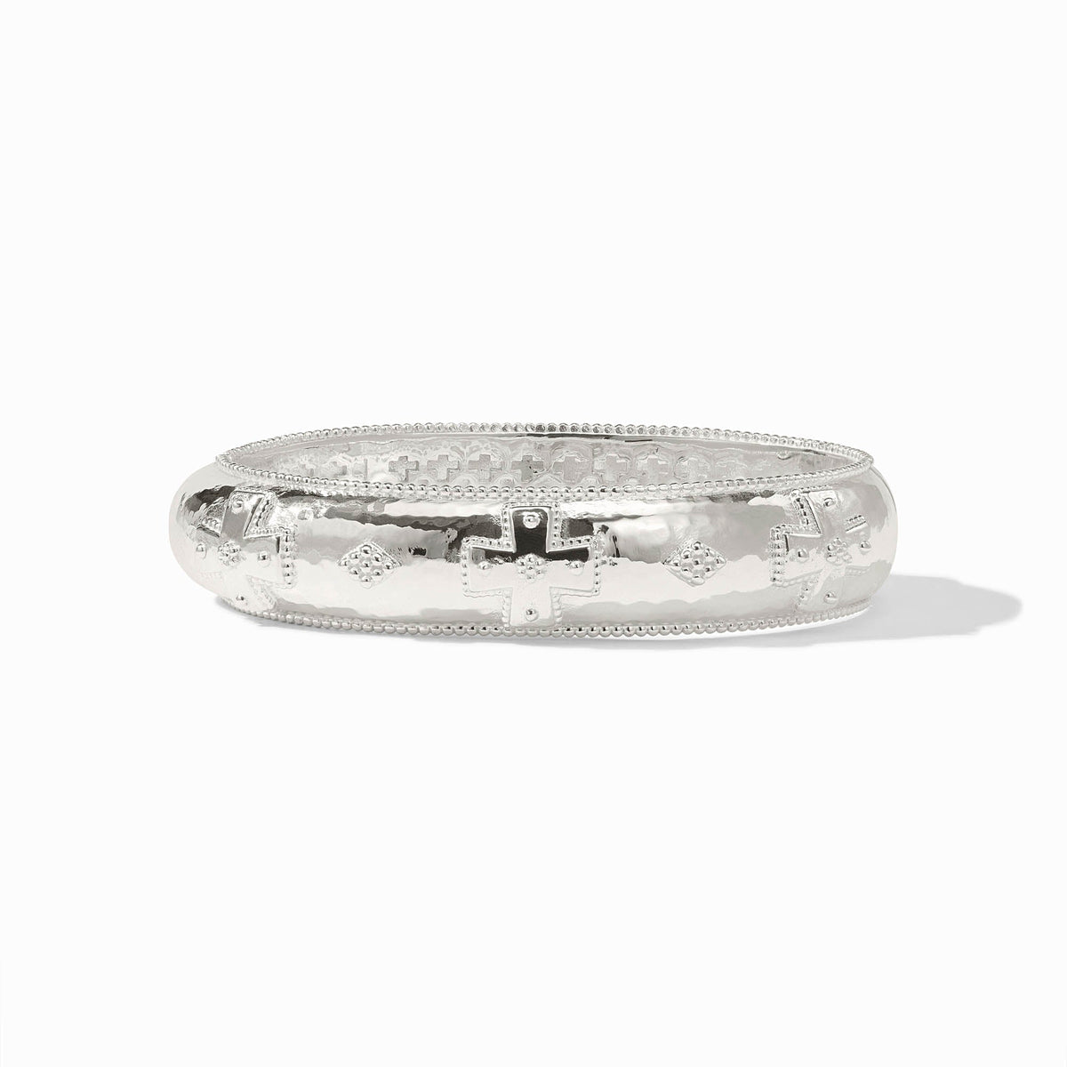 Sleek Canterbury Hinge Bangle in polished silver metal with a spring closure and structured silhouette.