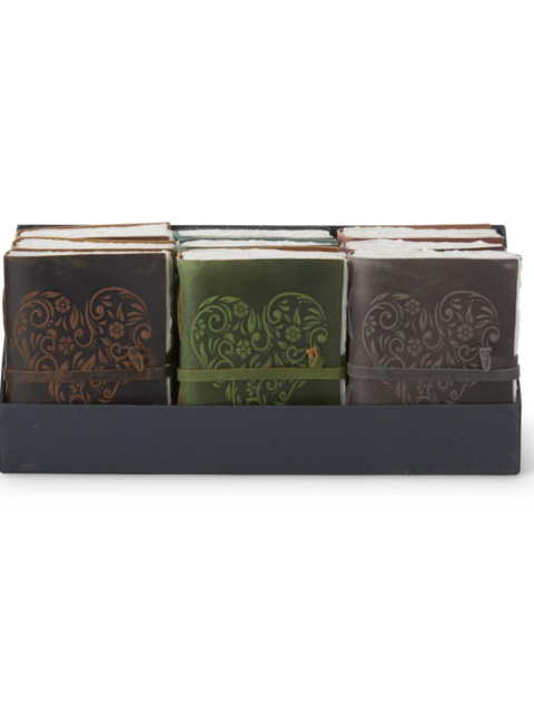 Three 8 inch leather journals with embossed heart designs in brown, green, and grey colors.