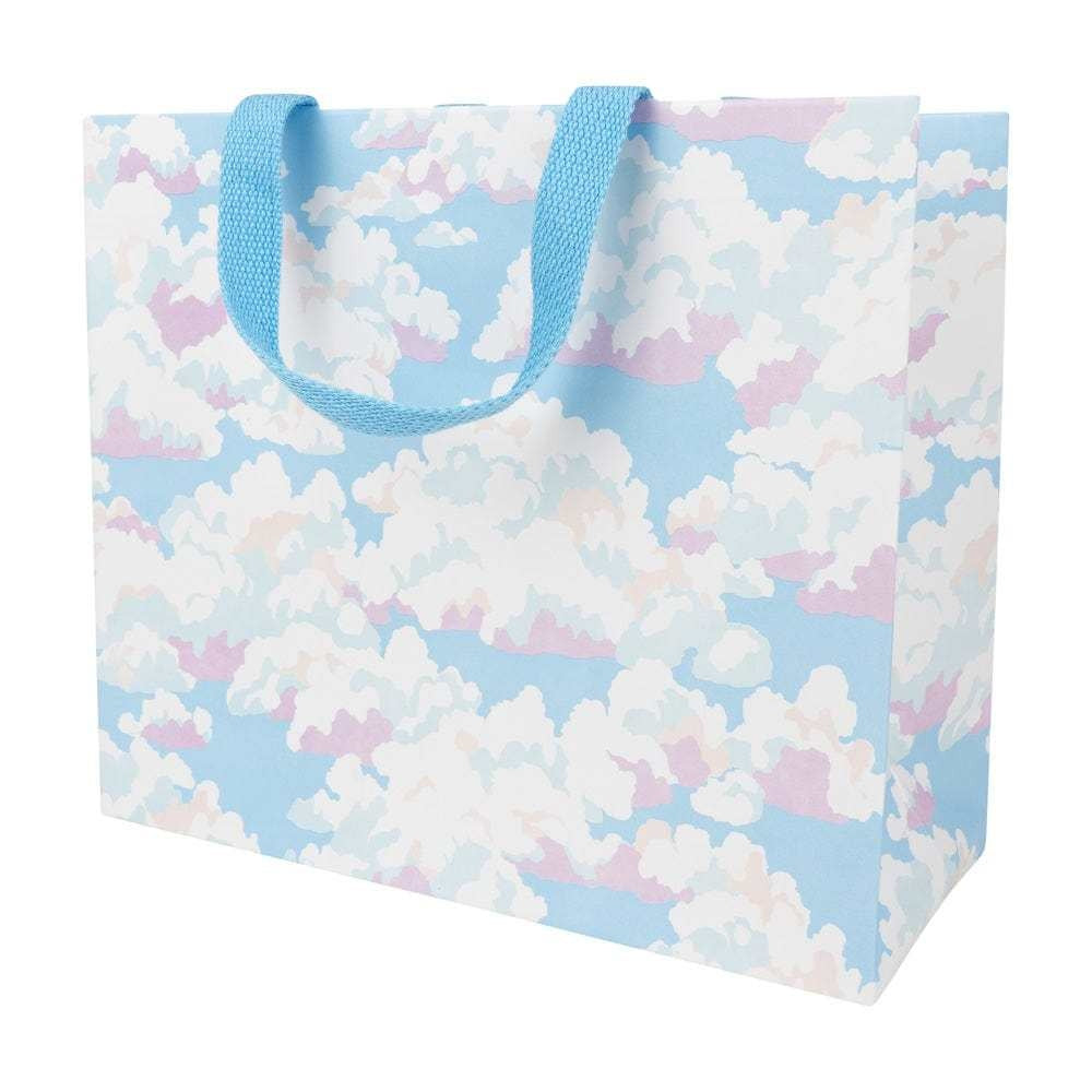 Large horizontal gift bag with blue sky print on durable paper featuring strong handles.