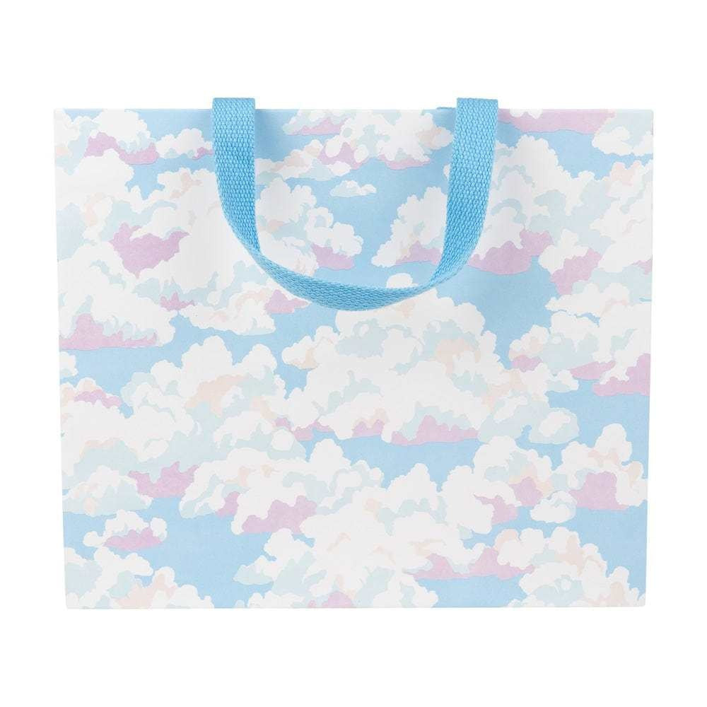Large horizontal gift bag with blue sky print on durable paper featuring strong handles.