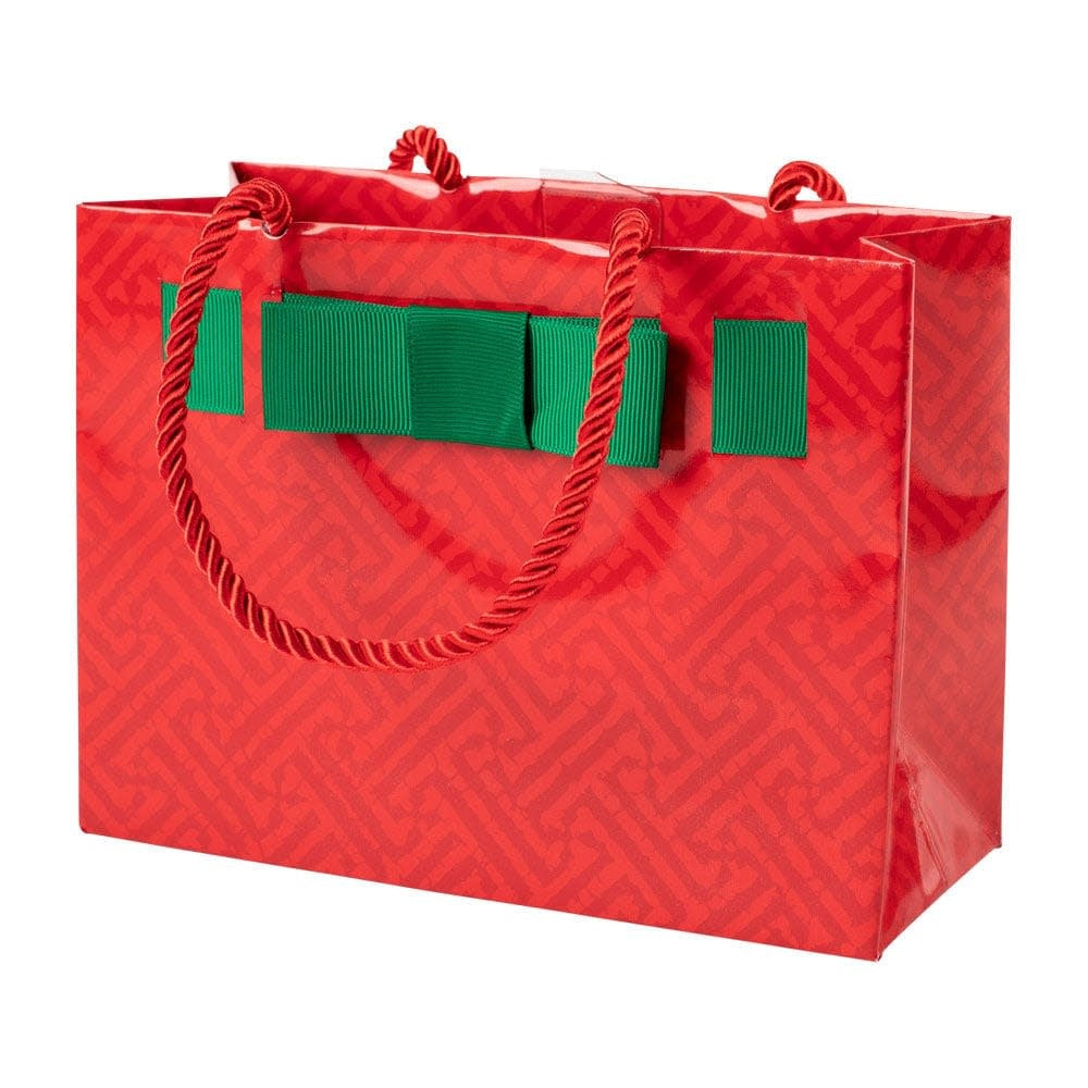 Small red gift bag with fretwork cutout handle printed on durable paper