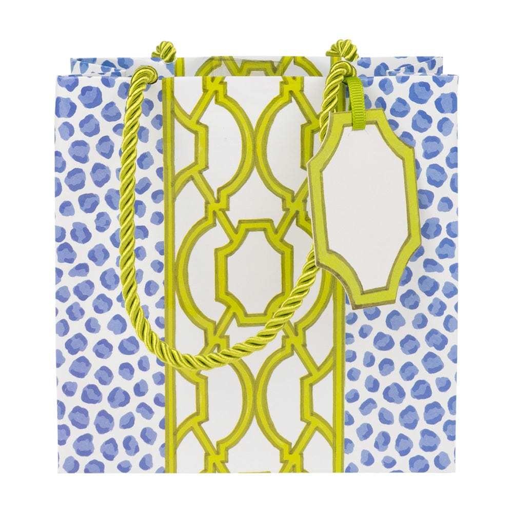 Small blue-green gift bag with knot-and-spots pattern on durable paper featuring a strong handle.