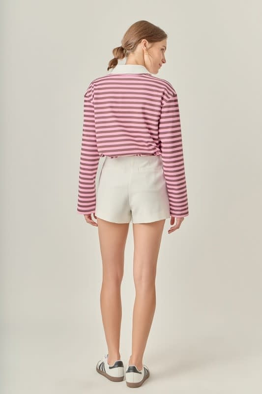 Back view of a pink striped rugby polo shirt with drop shoulders.
