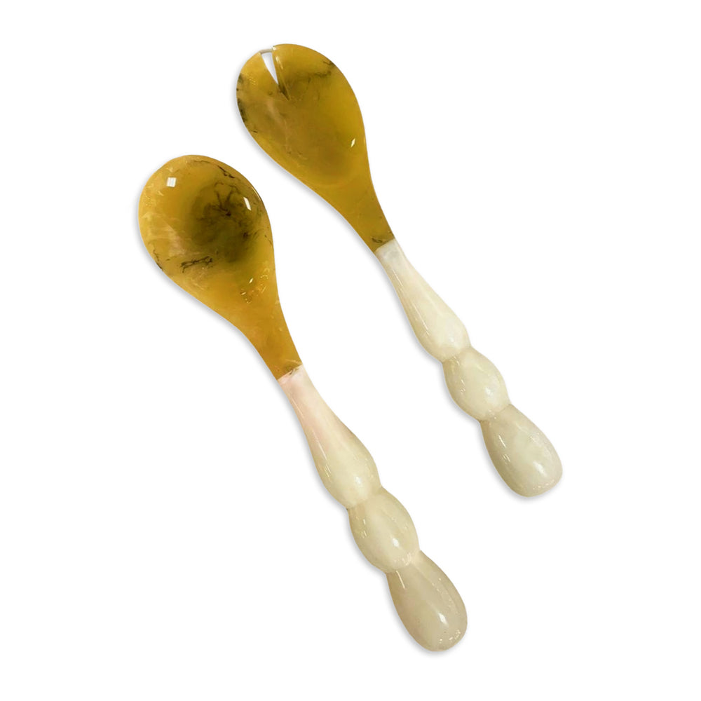 Resin Rio Bubble Salad Servers with translucent amber heads and white bubble-shaped handles.
