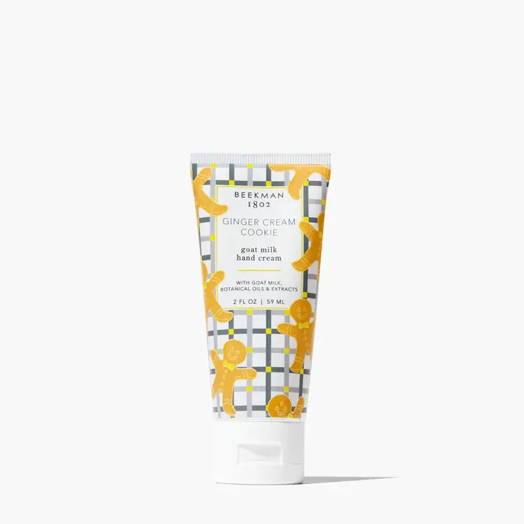 Beekman 1802 Ginger Cream Cookie goat milk hand cream in a 2 oz tube with gingerbread man pattern.