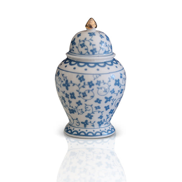 Small white ceramic ginger jar with a smooth rounded body and narrow neck.